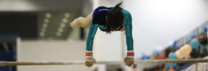 WAG gymnast on bars