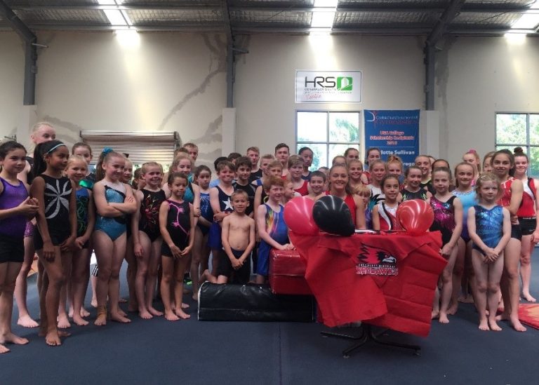 Mackenzie with CSG gymnasts GymnasticsNZ