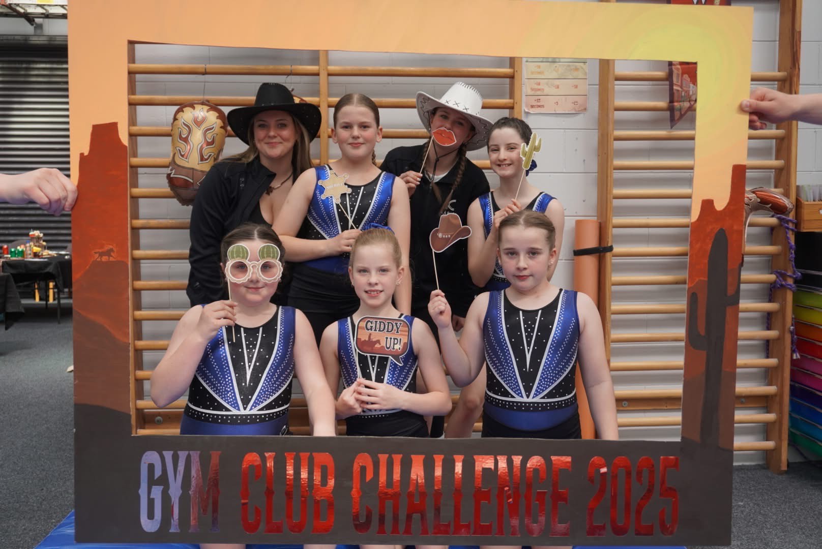 Gymnasts in costumes lined up in their teams for the NZ GymClub Challenge